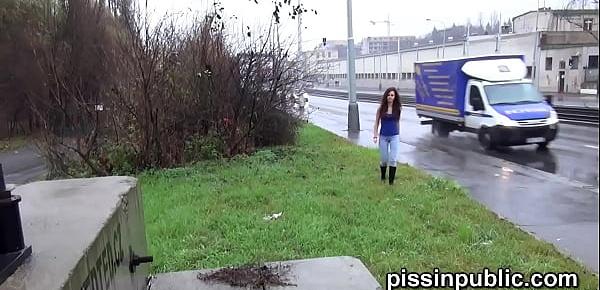  Naughty girls so desperate to empty their bladders that they are pissing next to busy roads